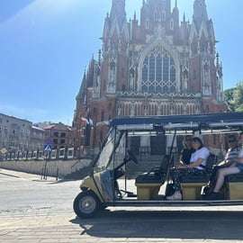 Cracovie : visite guidée de la ville en voiturette de golf avec prise en charge à l'hôtel